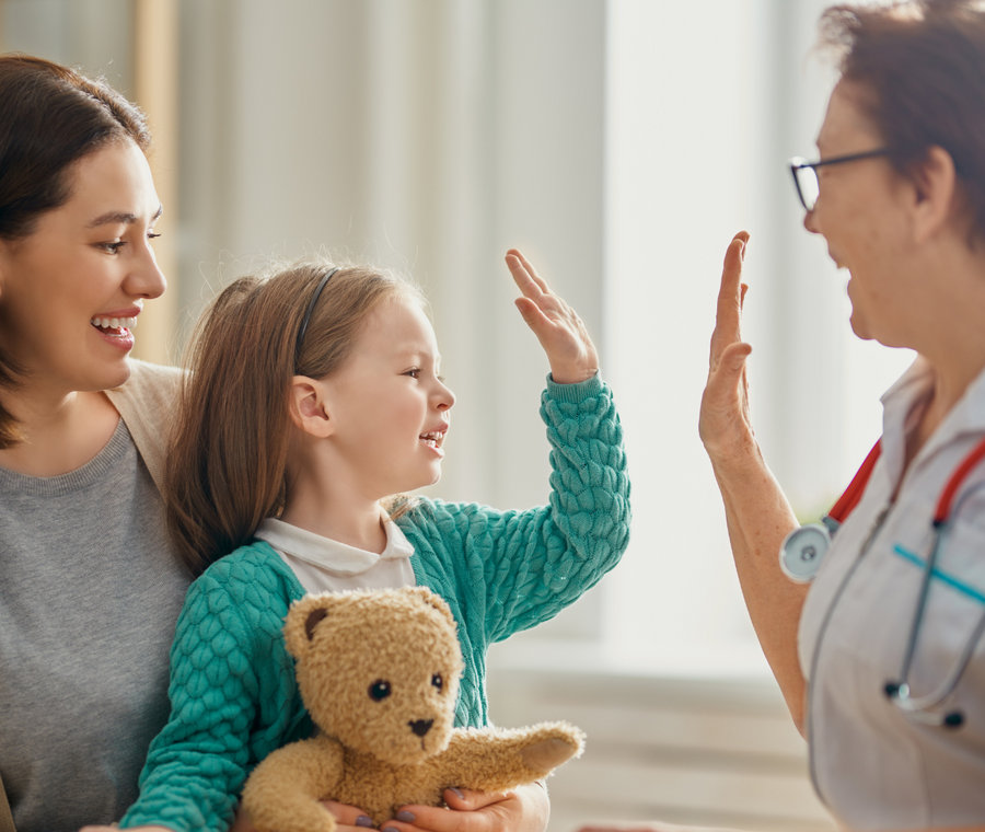 Pediatric doctor with a young patient