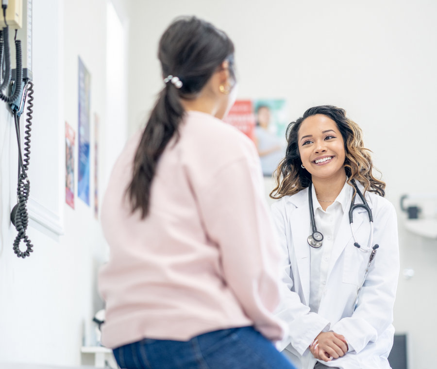 Life Coast Health clinician with a patient